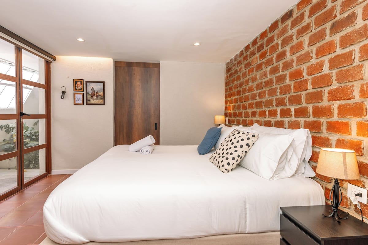 Deluxe Room, 1 King Bed, Balcony | In-room safe, desk, iron/ironing board, free WiFi