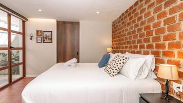Deluxe Room, 1 King Bed, Balcony | In-room safe, desk, iron/ironing board, free WiFi
