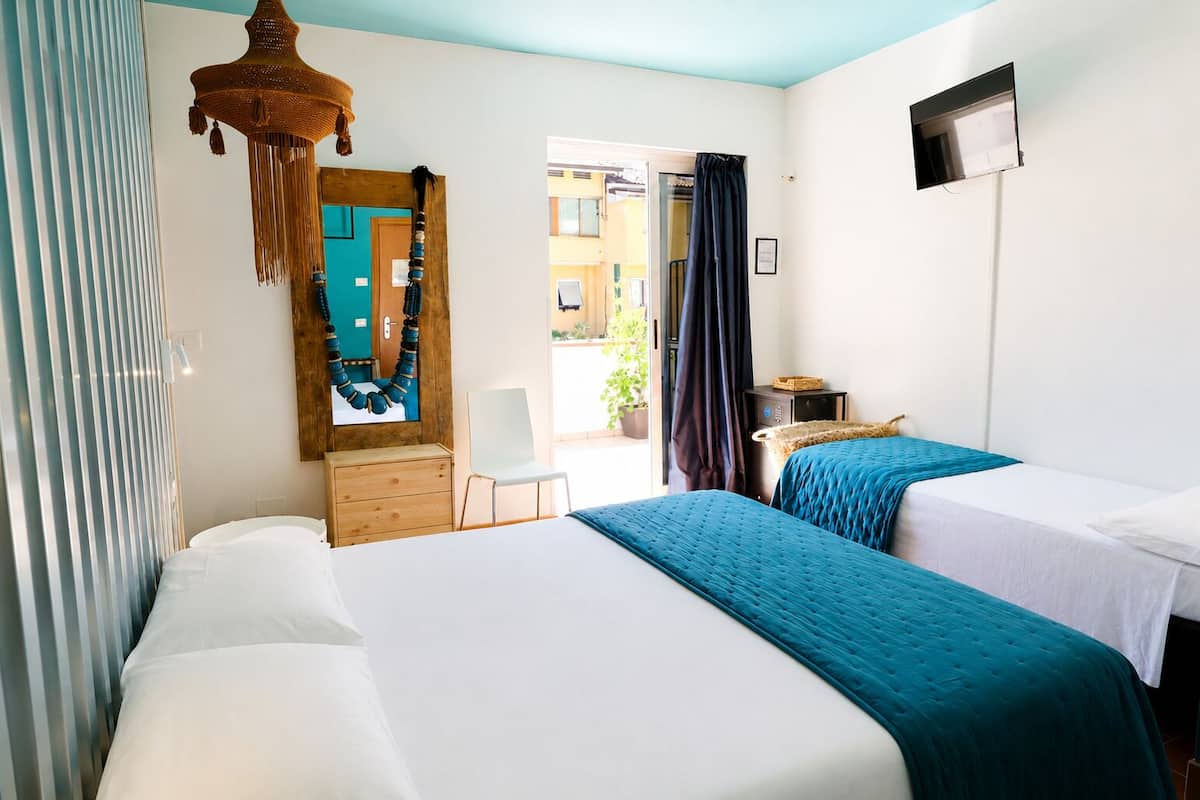 Exclusive Room, Pool View | In-room safe, iron/ironing board (on request), WiFi (free), bed sheets