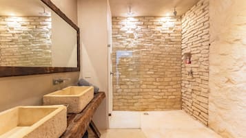 Deluxe Suite, Sea View | Bathroom | Shower, hair dryer, towels, soap