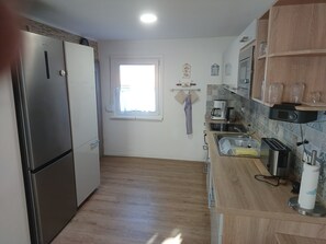 House | Private kitchen | Highchair - Holiday Home in Blankenburg (Blankenburg)