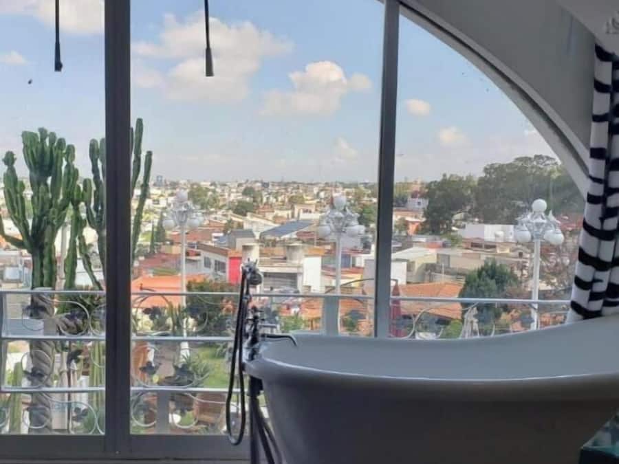 Vierpersoonskamer | Uitzicht op de stad