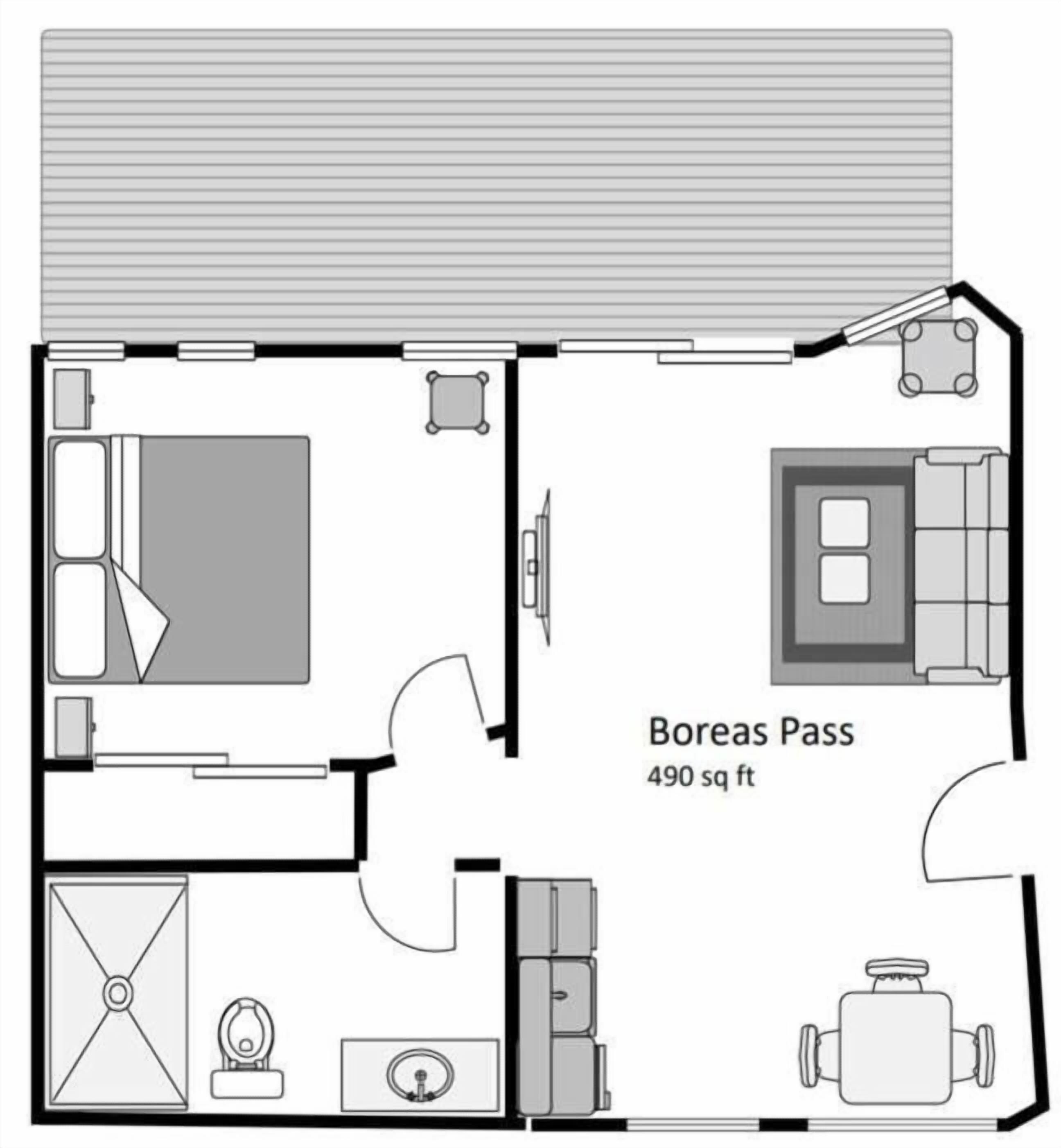Plano de planta de una habitación de 46 metros cuadrados llamada Boreas Pass, que incluye una cama, un escritorio, una silla, un baño pequeño y una kitchenette.