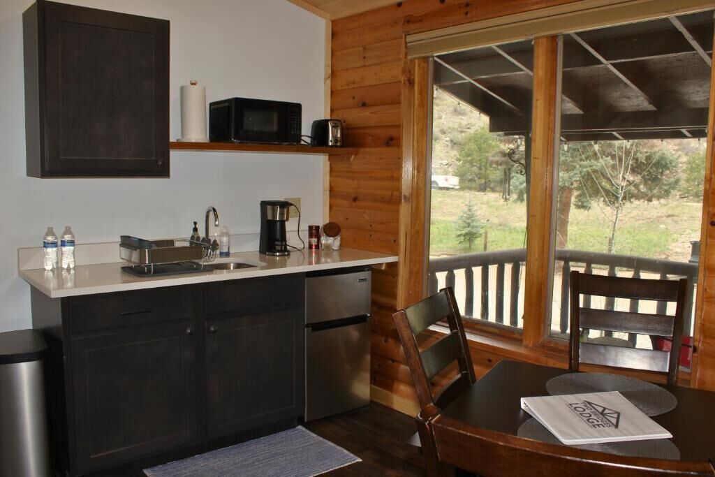 Suite – superior, elveutsikt | Eget kjøkken