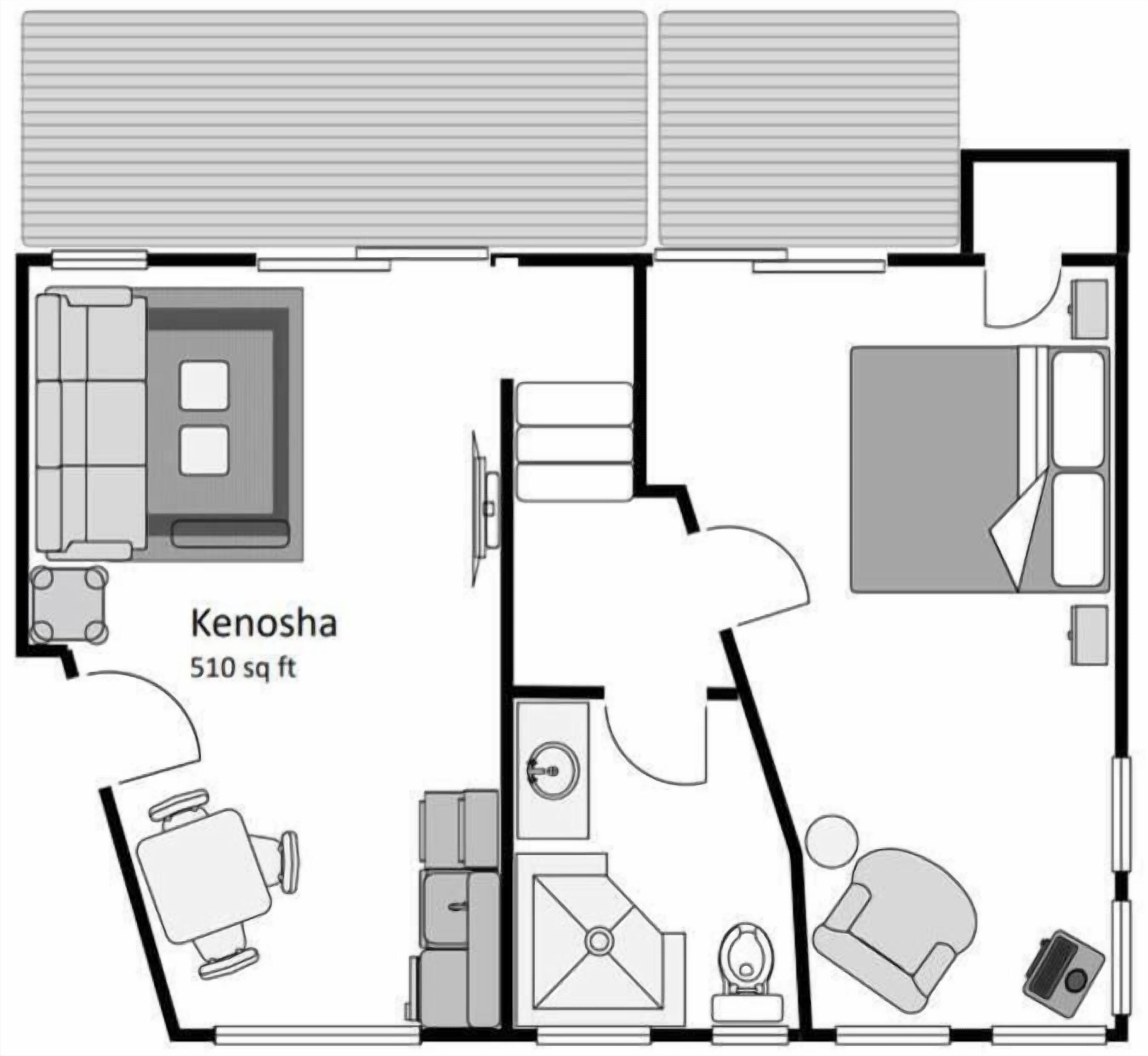Voici le plan d’une chambre d’hôtel, intitulée « Kenosha », d’une superficie totale de 47,4 mètres carrés (510 pieds carrés). Elle comprend un lit, un bureau, une chaise, une armoire, une salle de bain avec des toilettes et un lavabo, ainsi qu’un espace douche.