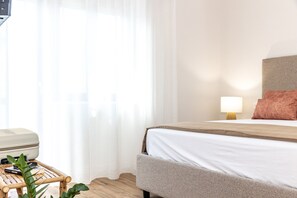 1 habitación, tabla de planchar con plancha, wifi gratis y ropa de cama 