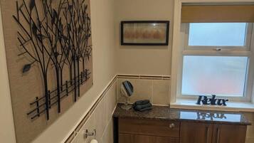 Hair dryer, towels, soap, toilet paper