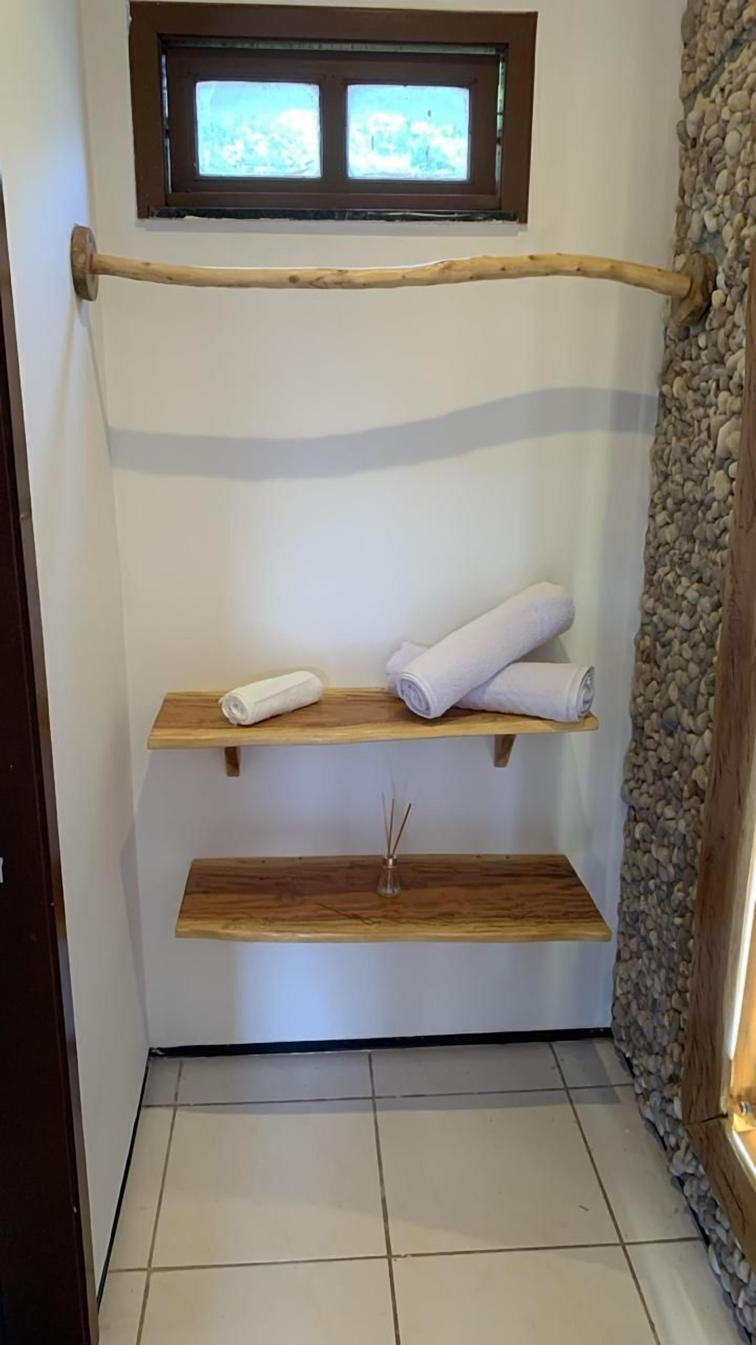 Shower, free toiletries, towels, toilet paper