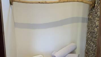 Shower, free toiletries, towels, toilet paper