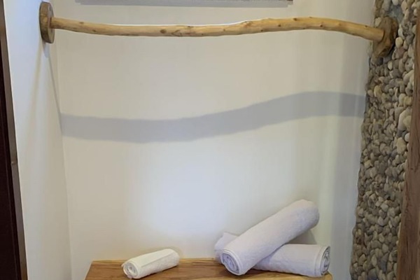 Shower, free toiletries, towels, toilet paper