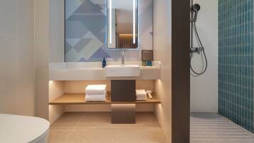 Suite, 1 Bedroom | Bathroom | Shower, hair dryer, slippers, towels