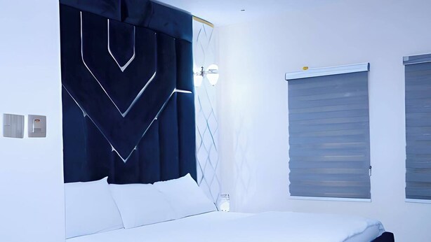 Economy Apartment, Balcony, City View | Desk, laptop workspace, blackout curtains, soundproofing - Dazzle Hotel and Apartment (Abuja)