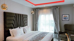 Economy Apartment, Balcony, City View | Desk, laptop workspace, blackout curtains, soundproofing - Dazzle Hotel and Apartment (Abuja)