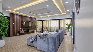 Appartamento Deluxe, vista mare | Area soggiorno