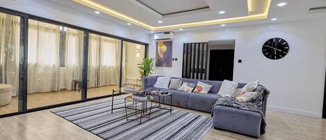 Deluxe-Apartment, Meerblick | Wohnbereich