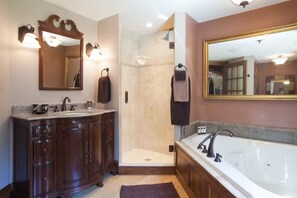Shower, jetted bath, eco-friendly toiletries, hair dryer - Windows on the Stream Suite at French Country Manor B&B (New Providence)