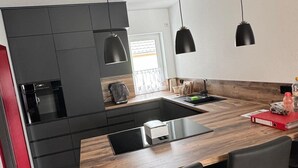Coffee/tea maker, fridge, oven, stovetop - Special accommodation with its very own style, modern and lovingly furnished, (Samtens)