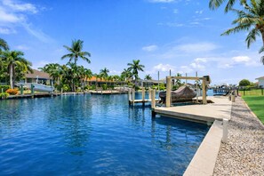 A heated pool - NEW! Gorgeous Waterfront Pool Home, Outdoor BBQ Kitchen, 2 Large Patios & Dock (Marco Island)
