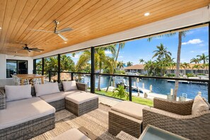 Outdoor dining - NEW! Gorgeous Waterfront Pool Home, Outdoor BBQ Kitchen, 2 Large Patios & Dock (Marco Island)