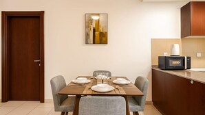 Dining - Convenient Location in JVC Bright 1BR with Balcony (Dubai)