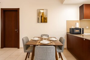 Dining - Convenient Location in JVC Bright 1BR with Balcony (Dubai)