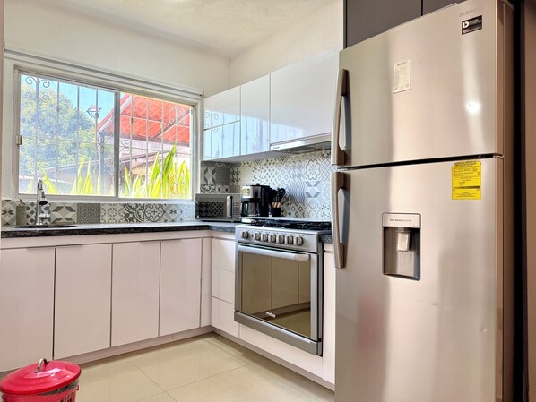 Microwave, oven, stovetop - Cozy 2 Bedroom Home in a Gated Community Near Beach, Airport & Services (Puerto Vallarta)