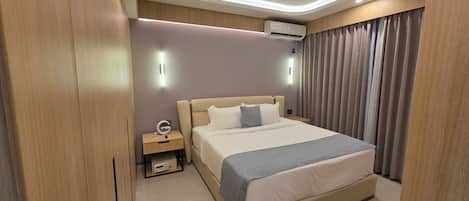 Suite Presidensial | Brankas, tirai kedap cahaya, setrika/meja setrika, dan Wi-Fi gratis