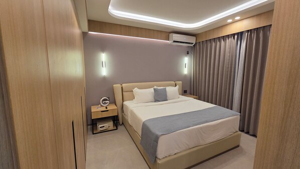 Suite presidencial | Caja fuerte, cortinas opacas, tabla de planchar con plancha