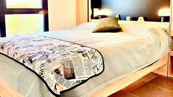 1 slaapkamer, een strijkplank/strijkijzer, reisbedje, gratis wifi