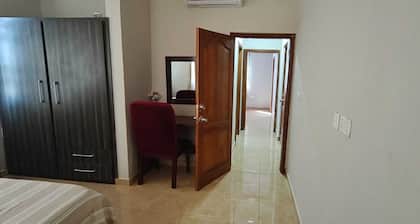 2-bedroom suite in delightful Elmina with AC, high speed internet. free parking.