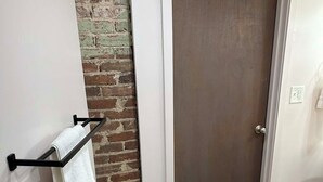 Shower, towels, soap, toilet paper - Private Guest Suite in Historic Home (Sioux Falls)