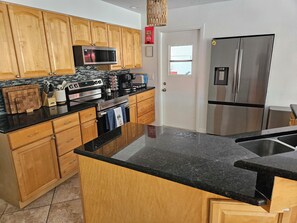 Microwave, oven, stovetop, dishwasher - Peaceful Beachside, Family Home w/ Heated Pool! (Satellite Beach)