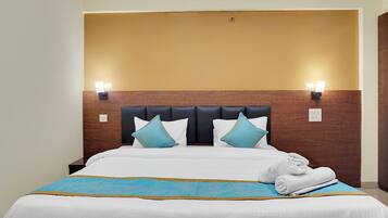 Chambre Deluxe | Draps en coton égyptien, literie de qualité, coffre-fort