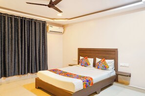 Egyptian cotton sheets, premium bedding, in-room safe, free WiFi - Fabhotel Living Suits (Bangalore)