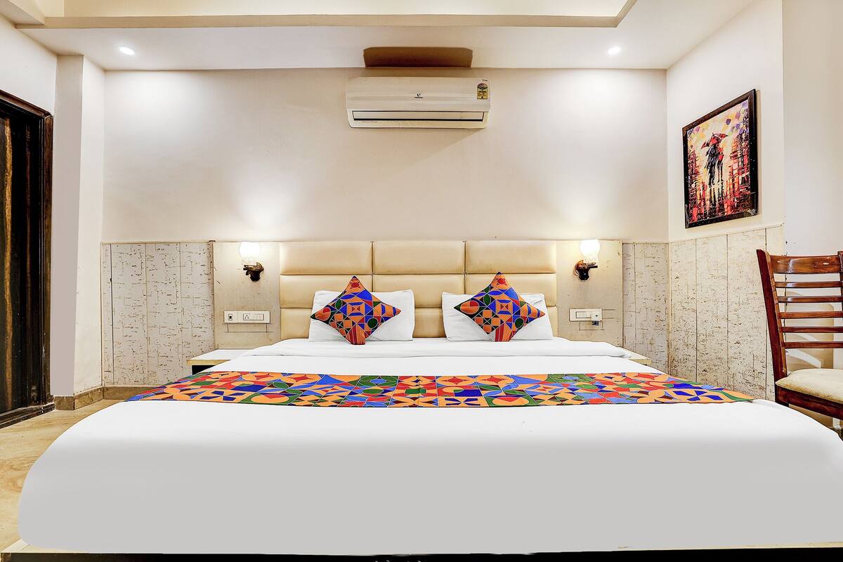 Deluxe kamer | Lakens van Egyptisch katoen, luxe beddengoed, een kluis op de kamer
