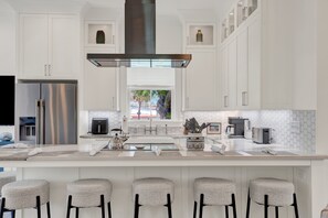 Fridge, microwave, oven, stovetop - Experience Coastal Elegance at This New Tybee Island Estate with Private Heated Pool (Tybee Island)