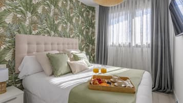 1 slaapkamer, een strijkplank/strijkijzer, internet, beddengoed