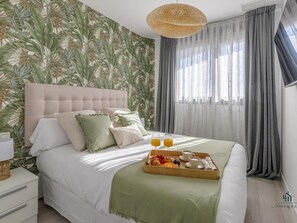 1 slaapkamer, een strijkplank/strijkijzer, internet, beddengoed