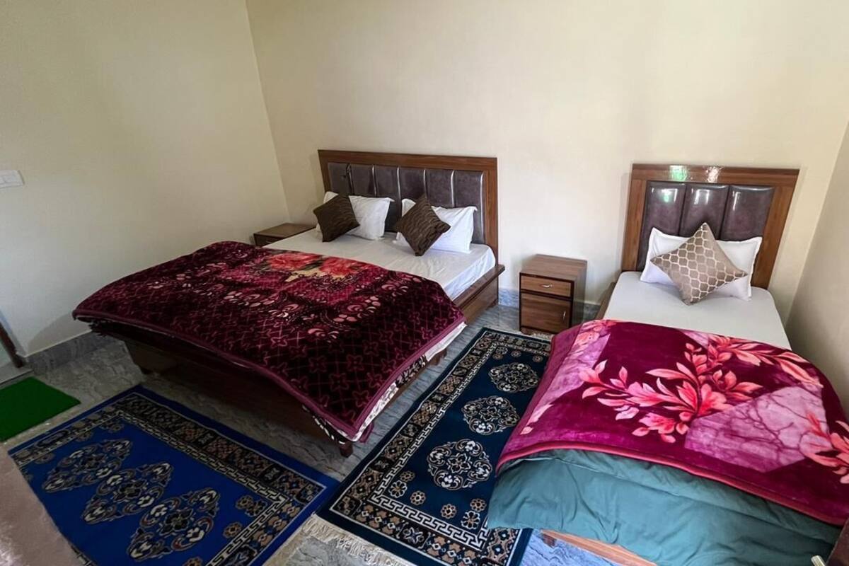 Premium bedding, desk, laptop workspace, bed sheets