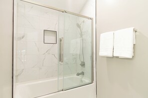 Hair dryer, towels, soap, shampoo