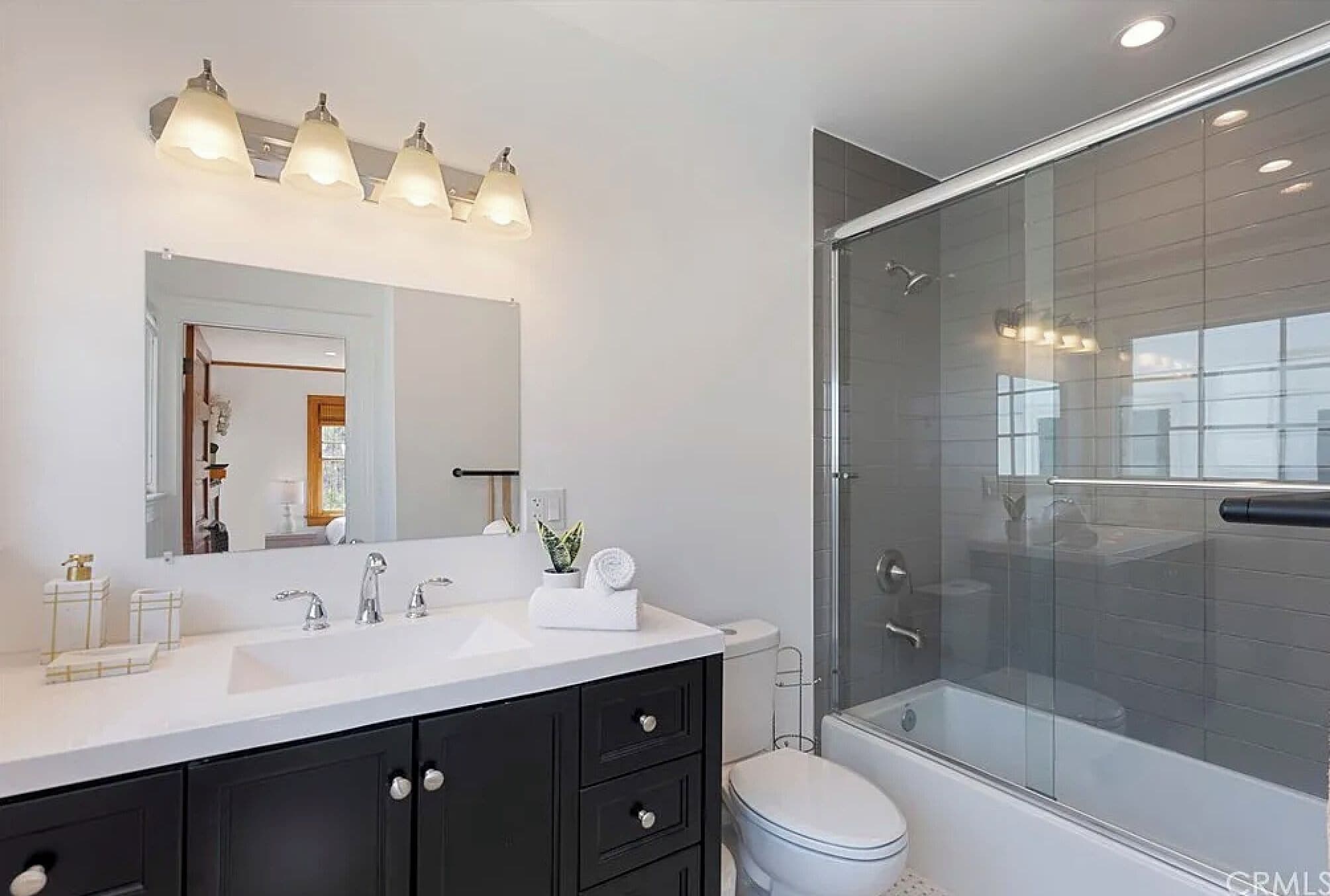 Shower, hair dryer, towels, toilet paper