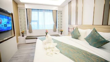 Deluxe Double Room, City View | Desk, laptop workspace, blackout curtains, free WiFi