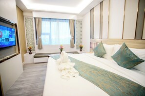 Deluxe Double Room, City View | Desk, laptop workspace, blackout curtains, free WiFi - Enrich Grand Hotel (Bangkok)