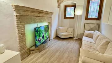 Appartement Deluxe, vue jardin | Coin séjour