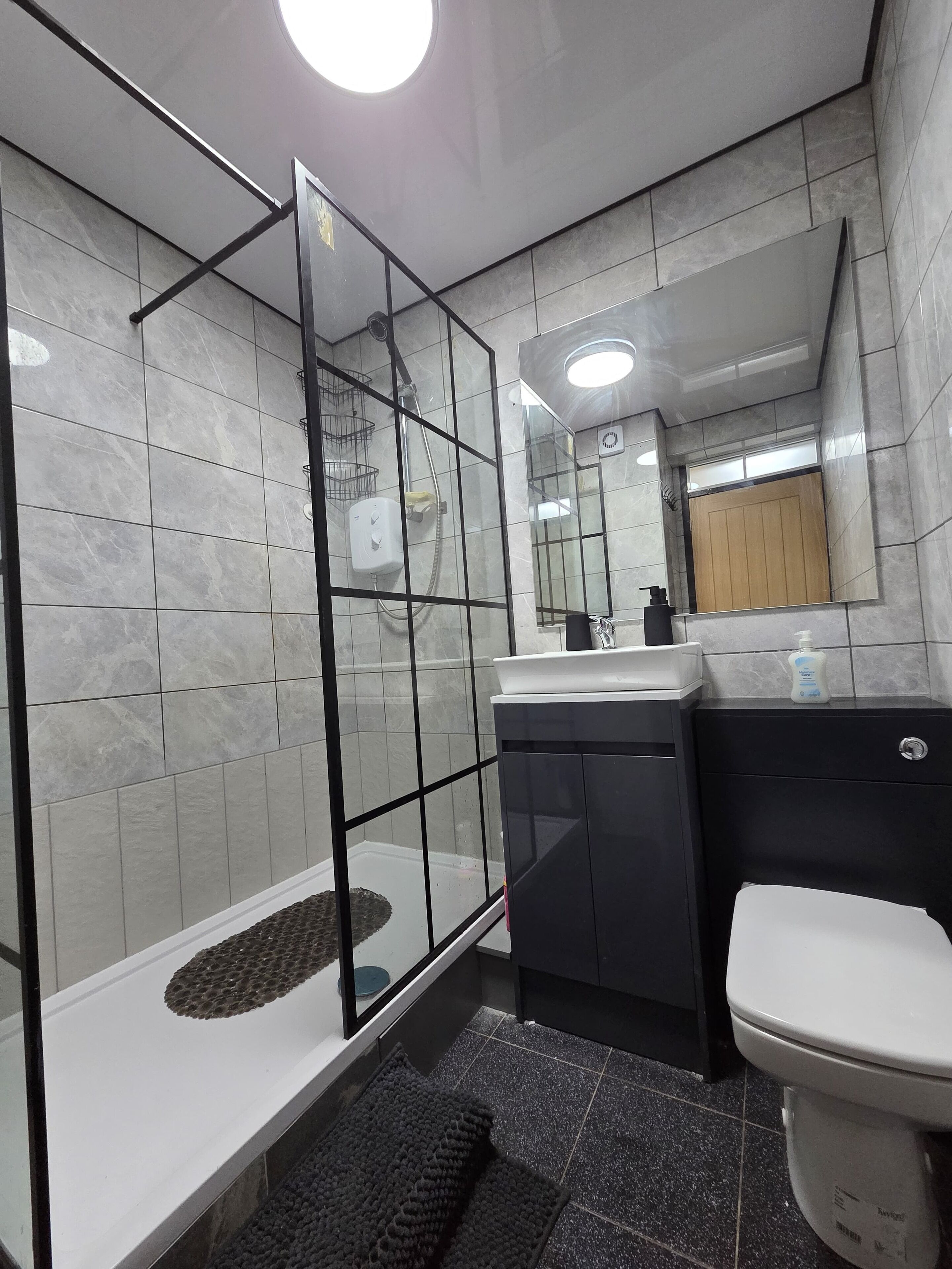 Hair dryer, towels, soap, toilet paper