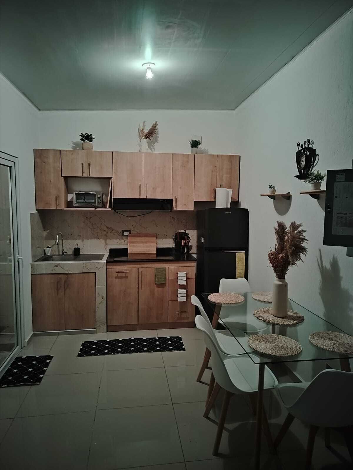 Fridge, microwave, stovetop, coffee/tea maker