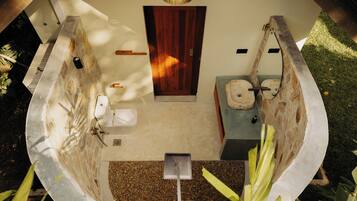 Deluxe Bungalow, Garden View | Bathroom | Shower, hair dryer, towels, soap