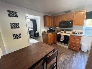 Fridge, microwave, oven, stovetop - Located in Basement of Twin Home. Relax & Play with Swim Spa & Game Room.  (Springville)