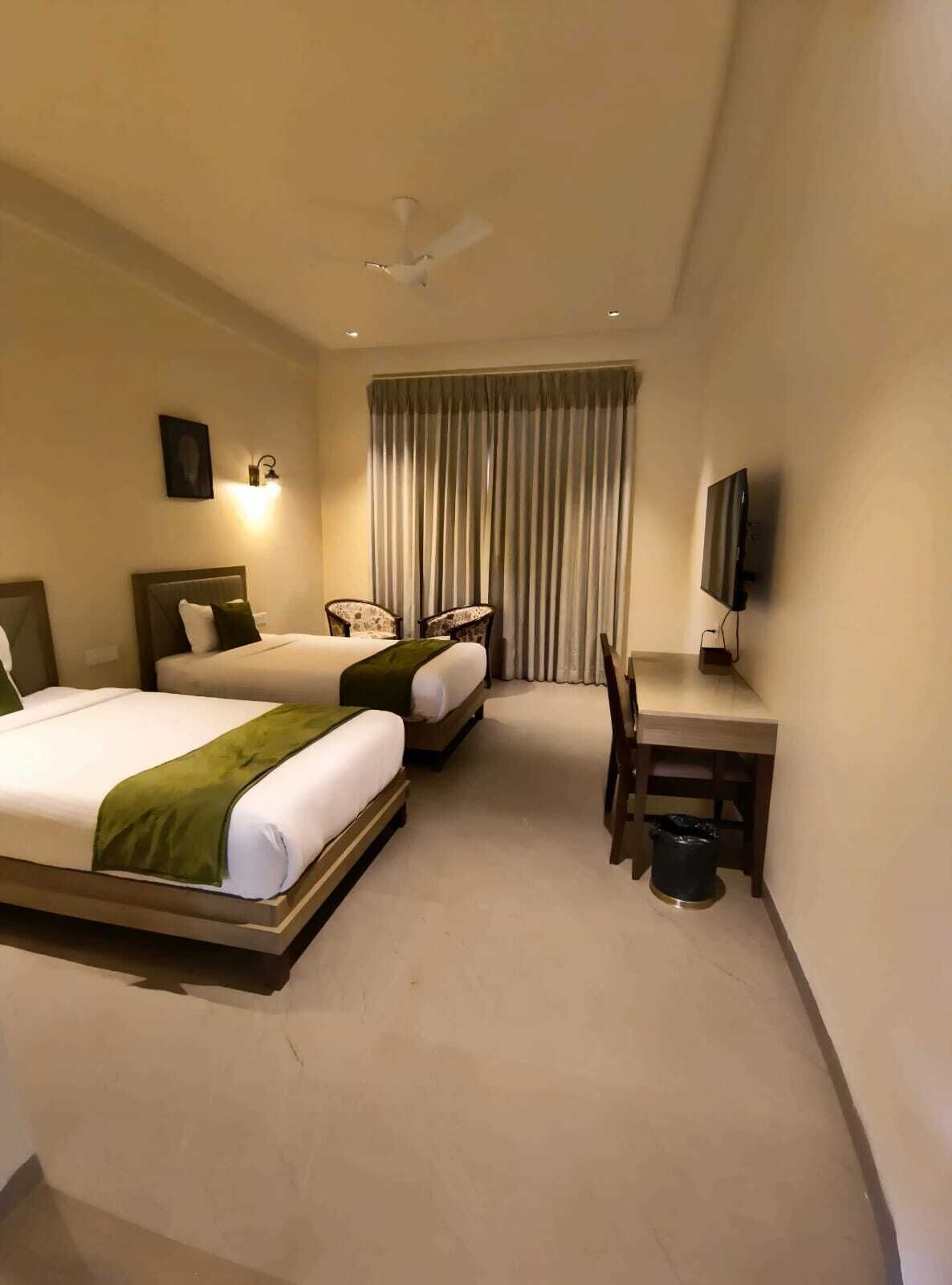 Economy Room, Balcony, Garden View | In-room safe, desk, laptop workspace, free WiFi