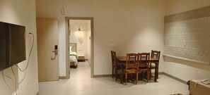 Family Suite Room | Egyptian cotton sheets, premium bedding, in-room safe, desk - Matsya Amazon Resorts  (Veldurti)